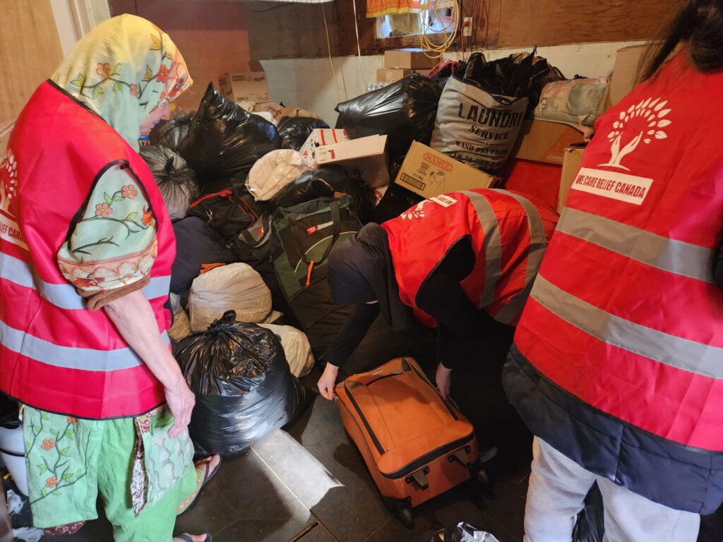 Volunteers organizing the collection drive items.